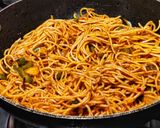 A picture of step 10 of Triple Schezwan fried rice.