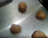 A picture of step 9 of Giant Peanut Butter Chocolate Chip Cookies.