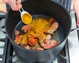 A picture of step 5 of Lamb & Chickpea Curry.