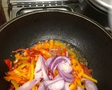 A picture of step 5 of Mac and bell peppers stir fry.