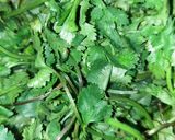A picture of step 1 of Green coriander & potato curry.