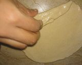 A picture of step 7 of Lacha Dar Paratha in layers of three kind.
