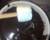 A picture of step 3 of 1 bite chocolatey marshmallow pops.