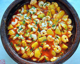 Foto del paso 10 de la receta: Gambas al fish masala con patatas confitadas en fumet de gambas