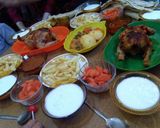 صورة لخطوة 8 من وصفة دجاج محشي أرز بالخضار في الفرن 🍗🐓