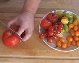 A picture of step 1 of Caprese Salad or Insalata Caprese.