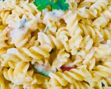 A picture of step 5 of Fusilli Pasta with White Creamy Sauce😋(Maize-Rice).