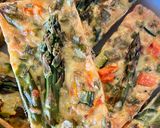 A picture of step 4 of Mini Quiches with Asparagus and Spring Vegetables.