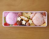 A picture of step 2 of Kirby and Waddle Dee Sports Day Character Bento.
