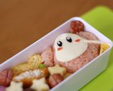 A picture of step 5 of Kirby and Waddle Dee Sports Day Character Bento.