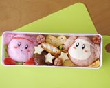 A picture of step 6 of Kirby and Waddle Dee Sports Day Character Bento.