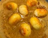 A picture of step 7 of Egg Masala curry.