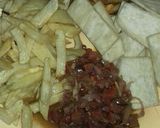 A picture of step 5 of Fried yam,chips,fried plantain n sausage sauce.