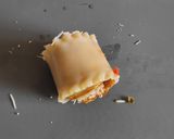 A picture of step 11 of Lasagna Rosettes with Eggplant, Taggiasca Olives, and Turmeric.