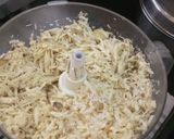 A picture of step 1 of Ratalyacha kees (grated stir fried sweet potato).