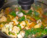 A picture of step 4 of Pea, Spinach, and Cauliflower Vegetable Curry.