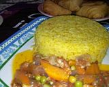 A picture of step 4 of Yellow jollof rice with chicken beast sauce.