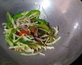 A picture of step 8 of Manchurian frankie roll.