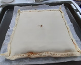 Foto del paso 7 de la receta: Empanada de hojaldre de salmón fresco y gambas