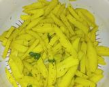 A picture of step 2 of French-Celery fries with fried eggs.