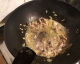 Une image de l'étape 6 de Tagliatelles noires aux têtes et pattes de calamars,échalotes,citron et persil.