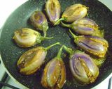 A picture of step 4 of Ramadan Special - Raw Mango Stuffed Baby Eggplants.