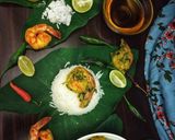A picture of step 3 of Kochupata diye Chingri(Prawn with Colocasia leaves).