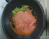A picture of step 2 of Tomato egg curry.