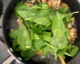 A picture of step 2 of Baked Salmon with spinach and mushroom.