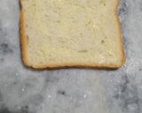 A picture of step 3 of Carrot toast with cheese spread.