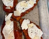 A picture of step 5 of Less saucy chicken Parmesan.