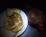 A picture of step 2 of Fried bacon and egg with hot drinking chocolate.