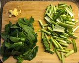 A picture of step 4 of Miso roasted squash with ginger garlic tofu and greens - vegan.