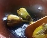 A picture of step 2 of Brinjal Curry in white gravy.