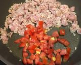 A picture of step 2 of Garlic Sausage and Tomato Spaghetti.