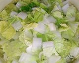 Foto langkah ke 2 dari resep Sup sawi tahu jamur.