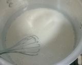 A picture of step 4 of Konafah pistacio with cream.
