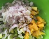 A picture of step 1 of Khatta meetha aam salad.