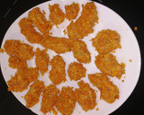 Foto del paso 4 de la receta: Pollo marinado rebozados con doritos (al horno)