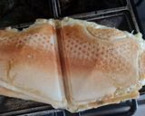 Foto del paso 4 de la receta: Sanguchito tostado de quesos Tybo y azul en sandwichera para hornalla