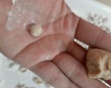 A picture of step 2 of Cowrie/ Kouri (Handmade cowrie shell shaped noodles) in Soup.