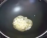 A picture of step 1 of White Cheese Sauce Pasta.