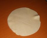 A picture of step 3 of Surprise bite (Maida/dry fruits).