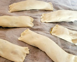 Foto del paso 5 de la receta: Cañas de hojaldre rellenas de turrón de chocolate y mermelada de naranja