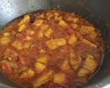 A picture of step 7 of "Aloo Tomato Curry".