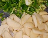 A picture of step 1 of Fry potato capsicum vegetable.