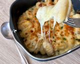 A picture of step 3 of Three Cheese Gnocchi Gratin in the Air Fryer: Gorgonzola, Parmesan, Mozzarella.
