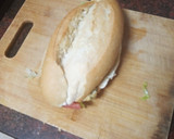 Foto del paso 4 de la receta: Bocadillo de merluza rebozada con ensalada y mayonesa