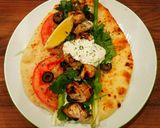A picture of step 12 of Mike's Grilled Chicken On Naan With Tzatziki Sauce.
