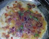A picture of step 5 of French-Celery fries with fried eggs.